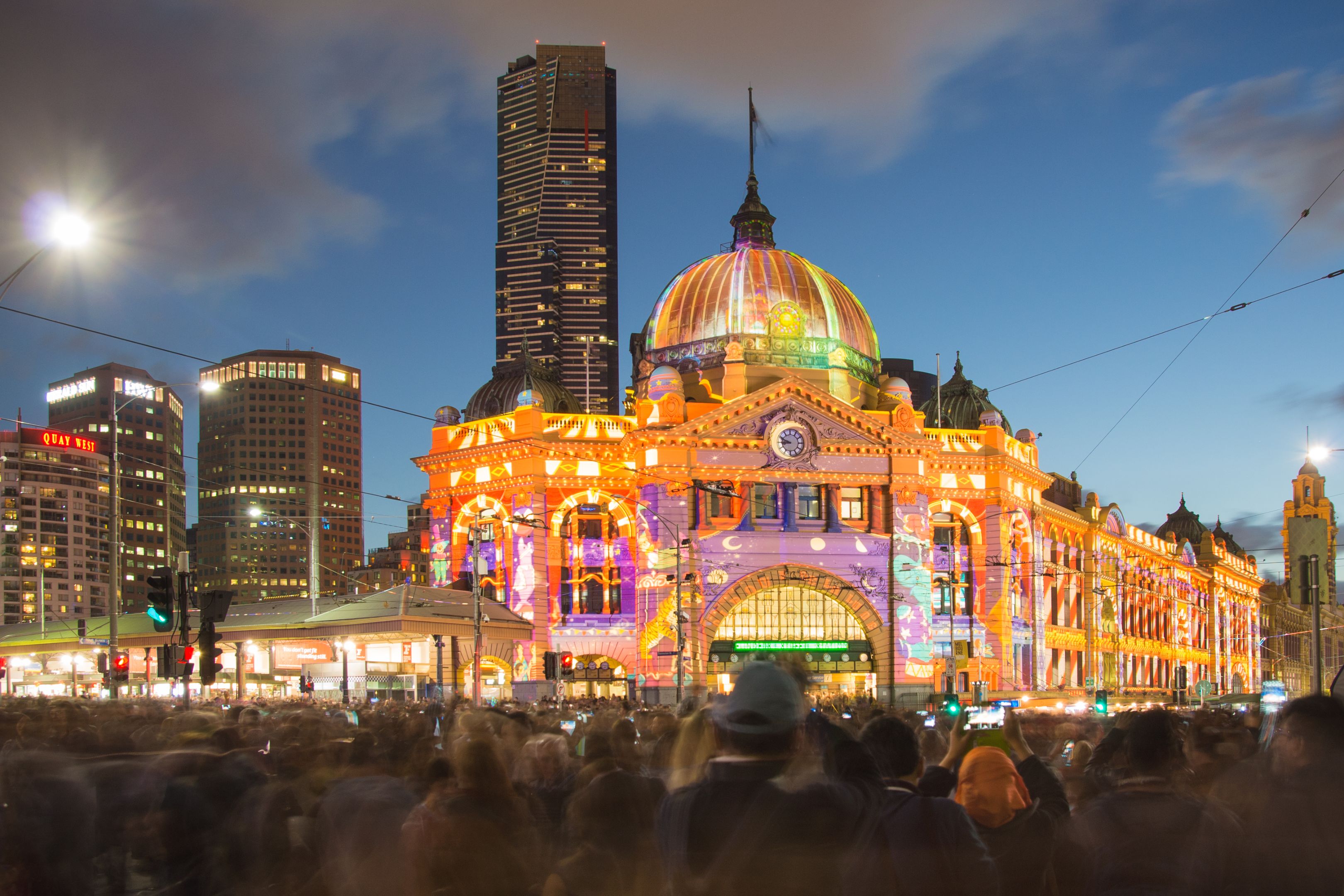 Flinders Street Station in Melbourne during the White Night Festival with large-scale artistic light projection.