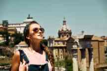 Young woman enjoying Rome colosseum