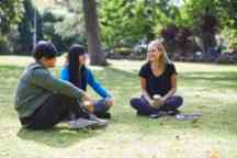 students-talking-in-park