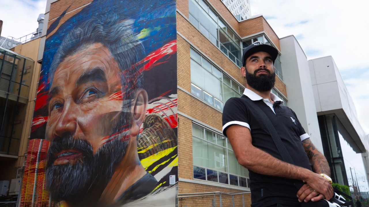Dr Andrew Peters mural by street artist Adnate on the CH building wall facing Burwood Road.