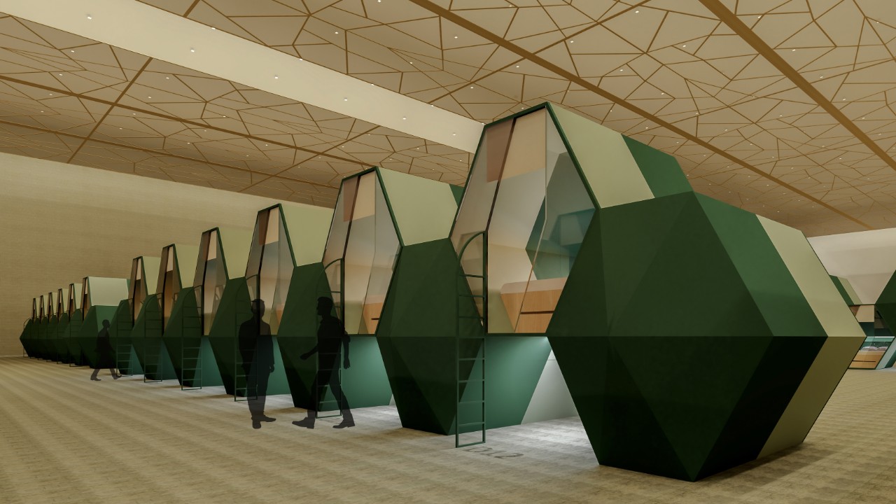 An interior design render of green hexagonal sleeping pods. 