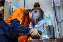 engineering fabrication student using a welder at the Wantirna campus